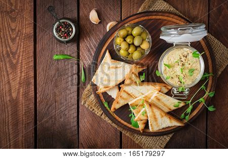Pate Chicken - Rillette, Toast, Olives And Herbs On A Wooden Board. Flat Lay. Top View