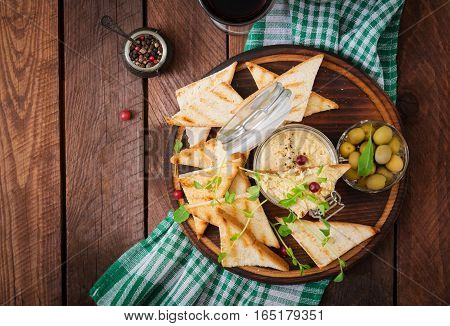 Pate Chicken - Rillette, Toast, Olives And Herbs On A Wooden Board. Flat Lay. Top View