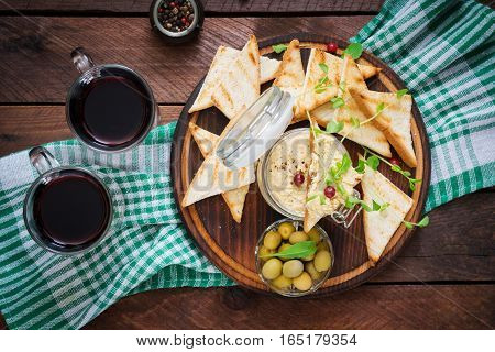 Pate Chicken - Rillette, Toast, Olives And Herbs On A Wooden Board. Flat Lay. Top View