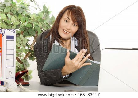 Young Woman Is Shocked By What She Sees In The Document