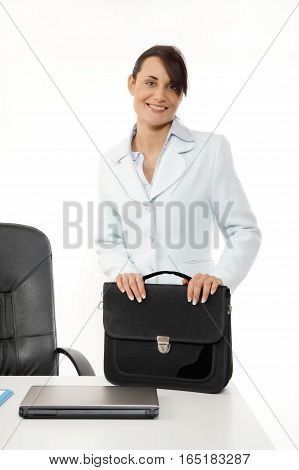 Young business woman with briefcase. Business concept.
