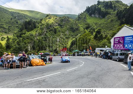 Col du Tourmalet, France - July 24, 2014: X'tras caravan during the passing of the Publicity Caravan on the road to Col de Tourmalet in the stage 18 of Le Tour de France 2014.