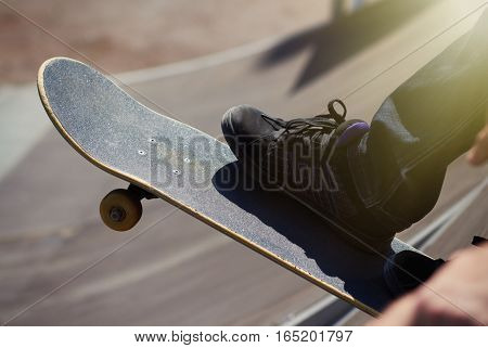 Skater Ready To Roll-in On A Quaterpipe