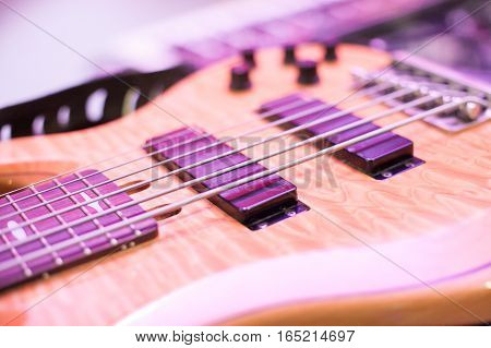 guitar strings close up, macro. semi-hollow body electric guitar close up.