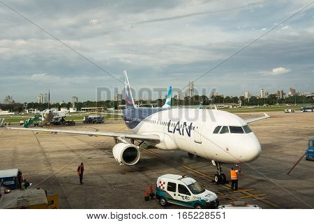 Buenos Aires Argenitna - October 31 2016: line airplane of LAN company parked for refueling and preparations before departure