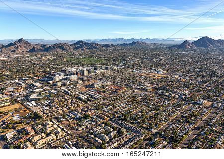 Morning sun on the desert landscape of Phoenix Arizona near the Camelback corridor viewed from above
