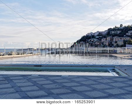 a swimming pool in winter time in italy