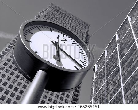 London, UK, September 26, 2009 :  Black and white image of Time is Money in Canary Wharf which is the largest business development in East London built on the site of the old West India Docks on the Isle Of Dogs