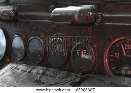 old car dashboard, analog ampermeter, tachometer and temperature