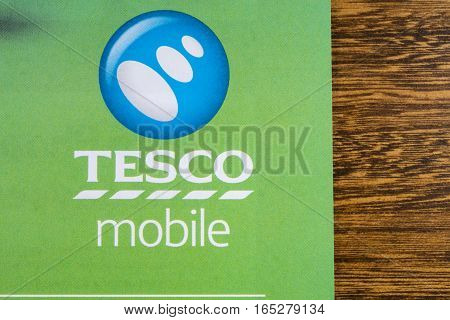 LONDON UK - JANUARY 13TH 2017: A close-up of the Tesco Mobile logo on a promotional leaflet on 13th January 2017.