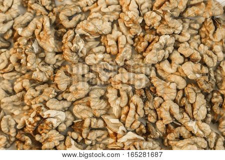 background of walnut kernels. Healthy natural food