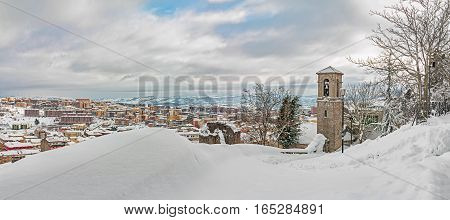 the snowy panorama with church of Campobasso
