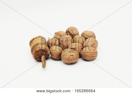 Dry figs and Walnuts isolated on white background