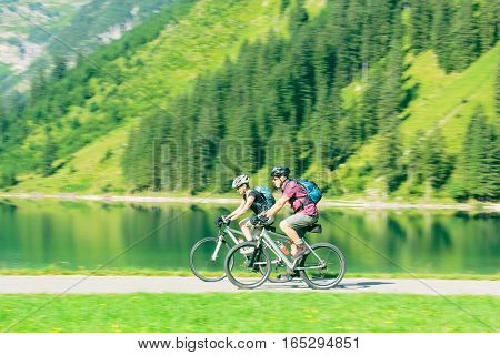 cycling seniors, by the vilsalpsee in austria