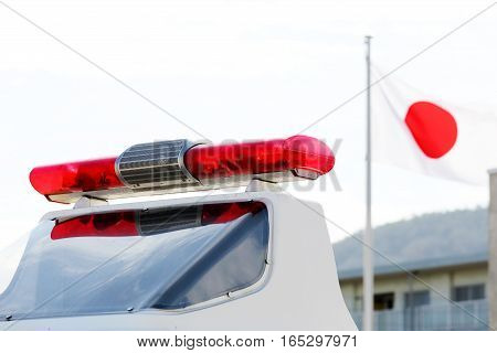 Roof mounted red lightbar of police car