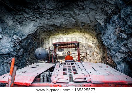 Gold mining underground. Drilling and explosive works.