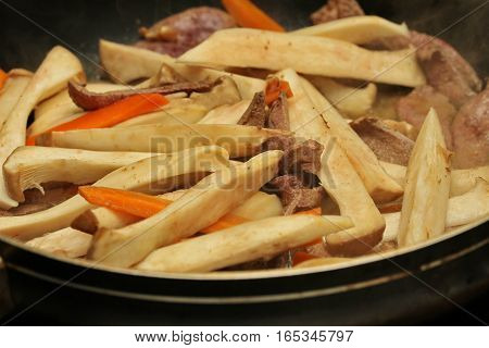 Cooking ,fried Eryngii Mushroom With Pork Liver And Carrot.