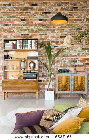 Living room interior with stylish antiques and souvenirs