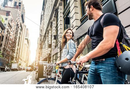 Couple of cyclist in New York - Couple of lovers sighseeing Manhattan on bikes