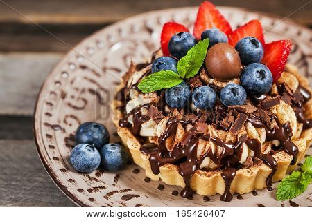 Banoffee Chocolate Pie Decorated With Chocolate, Fresh Blueberry And Strawberry
