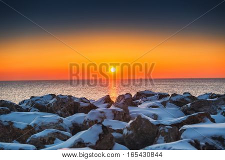 Early Morning With Snow Covered Stones