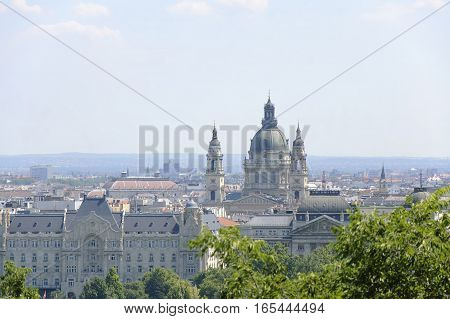 The view of the central part of Budapest and st. Istvan basilica at sunny summer day