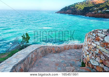 Spain. Catalonia. Costa Brava. Beach Sa Riera. Beautiful views of the Mediterranean coast. Tourist places. The picturesque promenade along the sea.