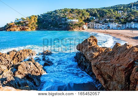 Spain. Catalonia. Costa Brava. Beach Sa Riera. Beautiful views of the Mediterranean coast. Tourist places. The picturesque promenade along the sea.