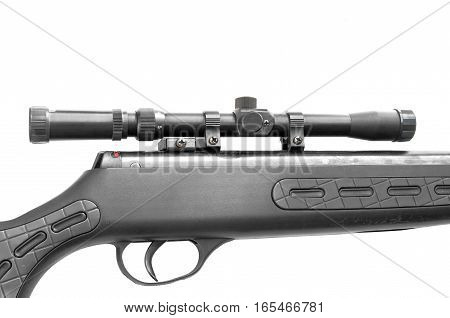 black scope close up on old sniper rifle isolated on white