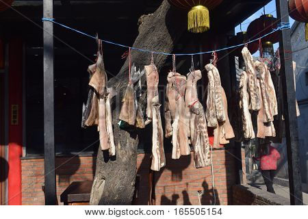 meat cupboard in Chinese hutong street in Asia