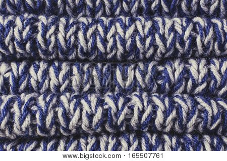 Blue knitted fabric texture. backhround or texture