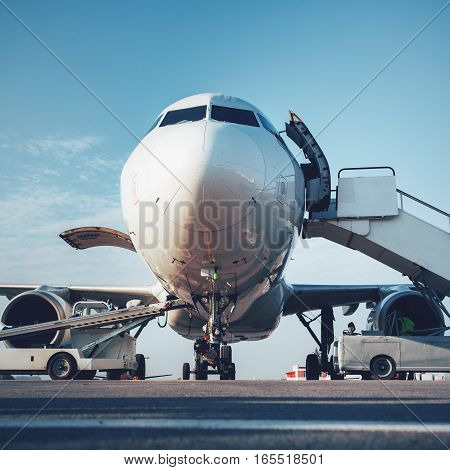 Baggage Is Loading Into Of The Aircraft