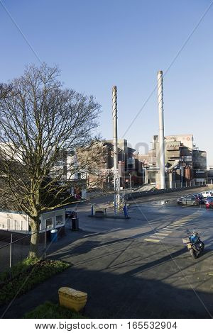 Leerdam, Netherlands, 4 january 2017: glass factory of Royal Leerdam in dutch town of Leerdam in the netherlands under blue sky