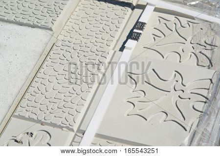 pavement tile with a pattern in the form of a maple leaf