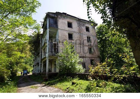 Abandoned mining ghost-town Polyana, Abkhazia. Destroyed empty houses, remnant of The Georgian-Abkhazian war