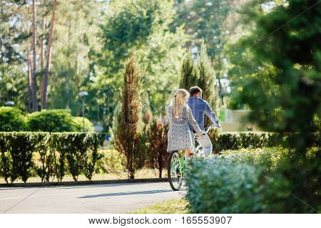 Couple With Tandem Bicycle