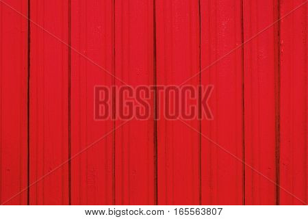 Texture of old wooden planks with peeling color paint