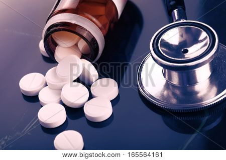 Medical concept with scattered pills on the CT scan.
