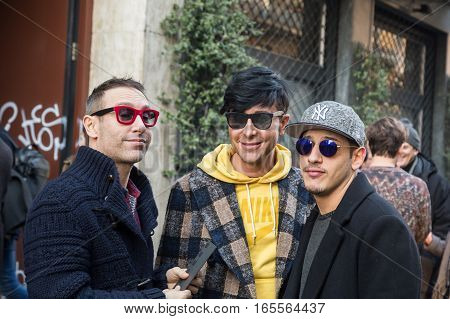 MILAN ITALY - JANUARY 15: Fashionable people gather outside Damir Doma fashion show building during Milan Men's Fashion Week on JANUARY 15 2017 in Milan.