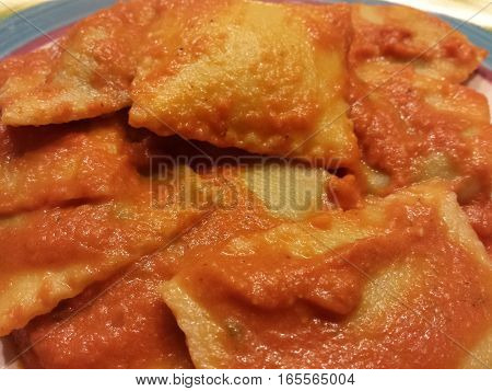 Ravioli with tomatoes sauce - italian food