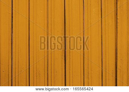 Texture of old wooden planks with peeling color paint