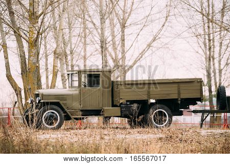World War II Old Russian soviet army military truck ZIS-5 outdoor in autumn forest