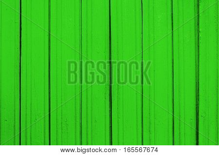 Texture of old wooden planks with peeling color paint
