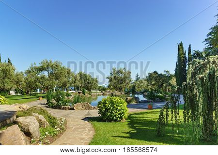 Pond and walkway in the Park of Paradise. Partenit Crimea Russia