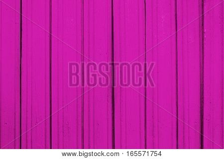 Texture of old wooden planks with peeling color paint