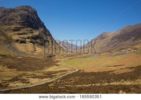 Glencoe Valley Scotland UK famous Scottish glen with mountains in Scottish Highlands in spring a tourist destination with blue sky and sunshine