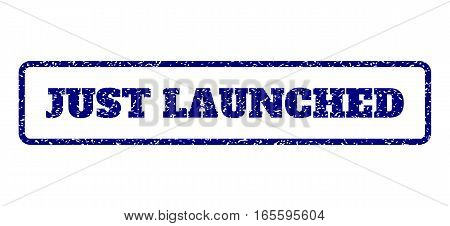 Navy Blue rubber seal stamp with Just Launched text. Vector caption inside rounded rectangular shape. Grunge design and dirty texture for watermark labels. Horisontal emblem on a white background.