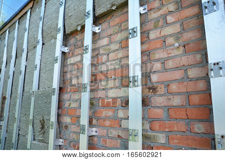 Exterior House Insulation Wall Outdoor. Home Insulation & Reduced Heat Loss Outdoor for Energy Saving.