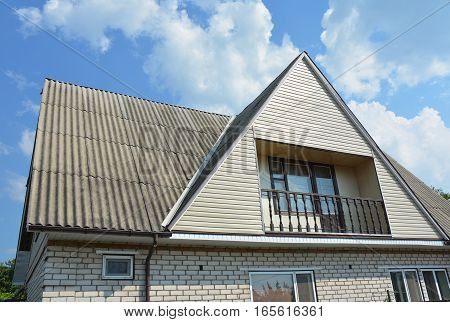 Gable and Valley type of roof construction. Building attic house construction with different types of roof designs