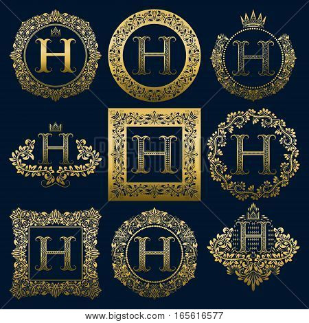 Vintage monograms set of H letter. Golden heraldic logos in wreaths round and square frames.